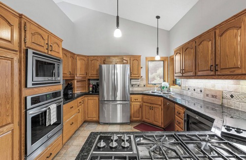 Andover House | Bunker Hills House - Near Trails! 2 Kitchens and Living Spaces