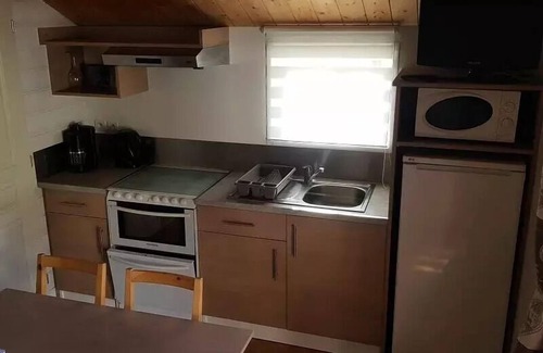 Saint-Martin-de-Queyrieres Ski Chalet | Camping-Caravaneige l'Iscle de Prelles * - Chalet Grand Confort Type Modulo 24 - 24 m2/2 bedrooms - Covered terrace 15 m2 6 people