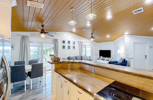 Key Largo House | Canal-front home with private dock, hot tub, water views, kayaks, & deck