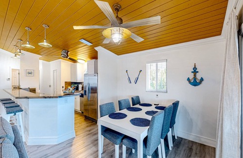 Key Largo House | Canal-front home with private dock, hot tub, water views, kayaks, & deck