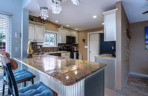 Bayshore Gardens House | CANAL FRONT W/DOCK, Water View, Dock your Boat, Free WIFI Dog - See Note Friendly!