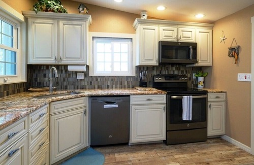 Bayshore Gardens House | CANAL FRONT W/DOCK, Water View, Dock your Boat, Free WIFI Dog - See Note Friendly!