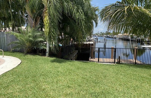 Garden Isles House | Canal home with pool and great sunset view!