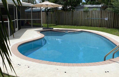 Garden Isles House | Canal home with pool and great sunset view!