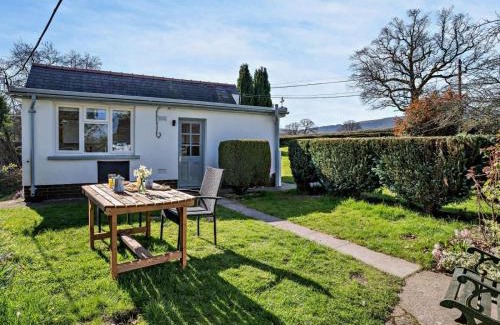 Llanover House | Canalside boathouse in the park