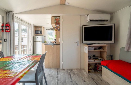 Foulquines RV Rental | Caravan 'Narbonne Plage' with Shared Pool, Private Terrace and Air Conditioning