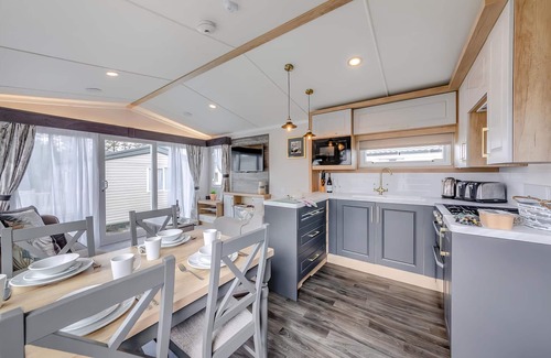 Waren Mill House | Caravan with one double and two twin.
