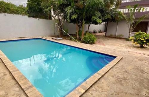 Bamburi Apartment | Carel Holiday Homes - Stylish 2 Bedroom with Pool