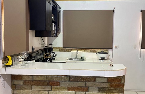 Santa Lucia Apartment | Caribe Rosa Charming 2-bedroom apartment in wonderful Limon with AC, WiFi