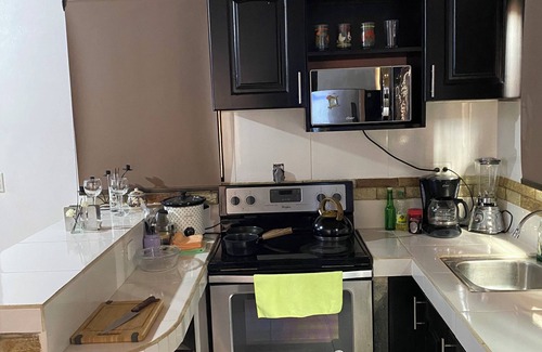 Santa Lucia Apartment | Caribe Rosa Charming 2-bedroom apartment in wonderful Limon with AC, WiFi