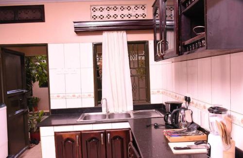 Namugongo Apartment | Carmella Exquisite Home Jjanda
