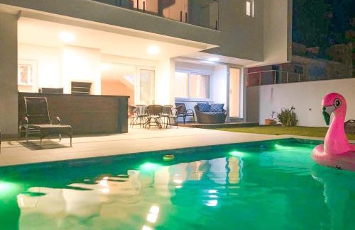 Jurere House | Casa com 4 suítes em Jurerê Internacional
