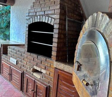 Alto de Buzios House | Casa com 5 suítes em Condomínio