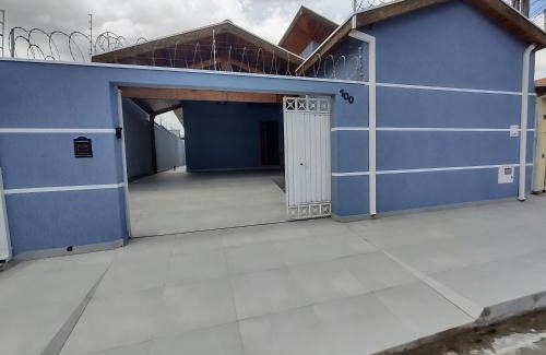 Jardim Gurilandia House | Casa com garagem, ar condicionado, sala tv e jantar, cozinha completa e lavanderia