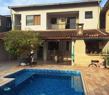 Quietude House | Casa com piscina, churrasqueira, estacionamento