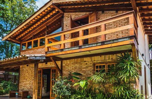 Centro Comercial House | Casa com quadra de tênis perto da Praia de Perequê