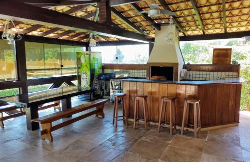 Capitolio House | Casa em Escarpas do Lago Ótimo Preço, Aconchegante, Área bem Ampla e Excelente Localização