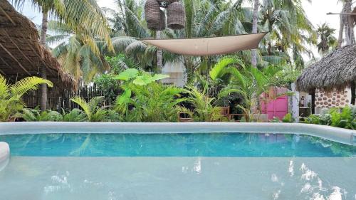 El Cuyo Hotel | Casa Maria Bonita Hotel & Restaurant El Cuyo by Spot Rentals