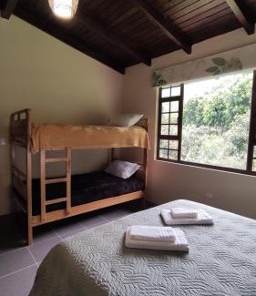 Banos de Agua Santa House | "Casa Verde" en Baños de Agua Santa con vista al volcán Tungurahua
