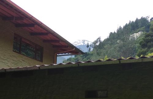Banos de Agua Santa House | "Casa Verde" en Baños de Agua Santa con vista al volcán Tungurahua