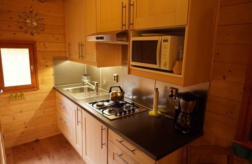 Porlezza Ski Chalet | CASASdeCASPER / Italy by the water. With views of the lake and mountains.