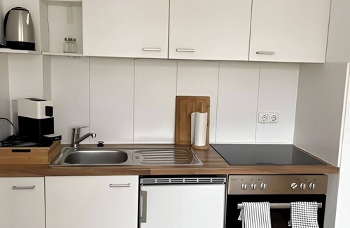 Frohnhausen Apartment | Central, cozy, close to the trade fair! BE1L