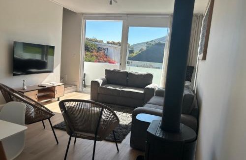 Hermanus City-Centre Apartment | Central Town Duplex with Pool, BBQ & Mountain View