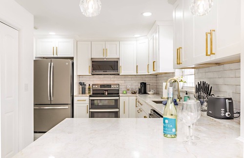 Parrot Cove House | Centrally located luxe poolside oasis w/standout amenities!