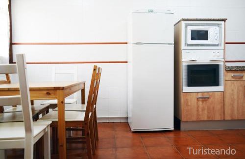 San Vicente de la Barquera House | Chalet Adosado Proa - Parking y jardín con impresionantes vistas a la Ría de San Vicente de la Barquera