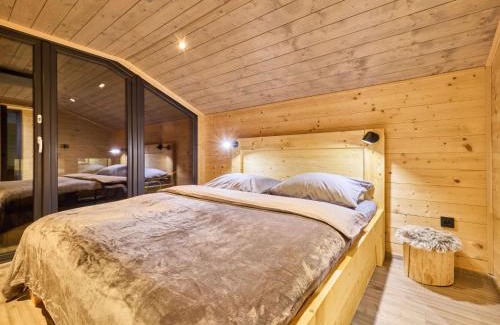 Mlade Buky Ski Chalet | Chalet Luxe Timber Lodge & Relaxing Bath by Interhome