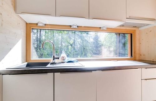 San Genesio Atesino Ski Chalet | Chalet on the edge of the forest with a large glass front