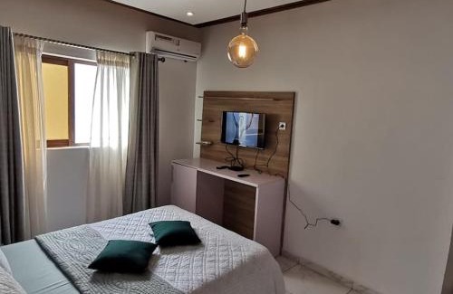 Limbe Apartment | Chambre de luxe chez FOUR IN ONE Résidence