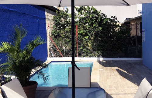 Ponce Centro Apartment | Chandelier 102