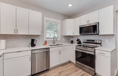 Charlotte House | Charlotte 5 BR Home W/Hot Tub, Grill and Games! Camp North End, Airport, Uptown