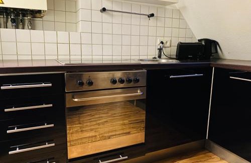 Nord-Mitte Apartment | Charmante Ferienwohnung mit Kaminofen