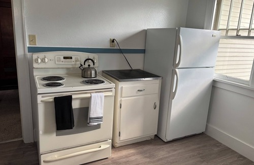 Rawlins House | Charming 1-bedroom Duplex with AC, WiFi, Gym access etc.