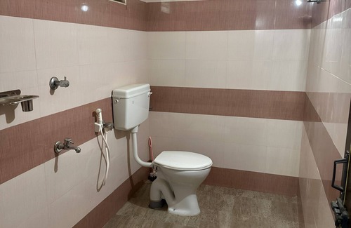 Quilandi House | Charming 1-bedroom house in Koyilandy with WiFi and 2 bunk beds