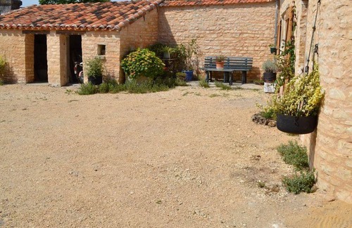 Saint-Angeau Cottage | Charming 19th-Century Farmhouse: Fireplace, Garden, Bikes, Baby Gear & More in Tranquil Setting