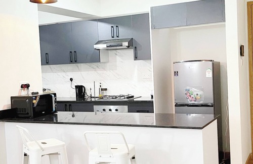 Nairobi Condo | Charming 2-bedroom condo in enchanting Nairobi with fitness room & swimming pool