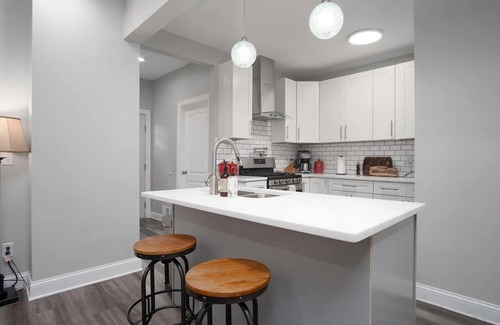 Near East Columbus House | Charming 4 Bedroom Home Near Downtown Columbus with Garage Parking and Backyard.