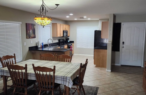 Mountain Vista Ranch House | Charming 4-bedroom pet friendly oasis with WiFi, AC in peaceful Surprise.