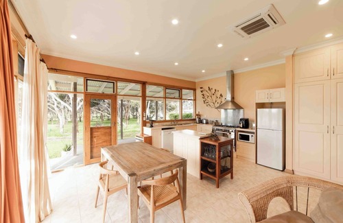 Macgillivray Cottage | Charming and Private Cottage with Fireplace for a Cozy Island Getaway.