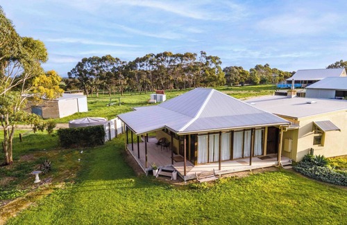 Macgillivray Cottage | Charming and Private Cottage with Fireplace for a Cozy Island Getaway.