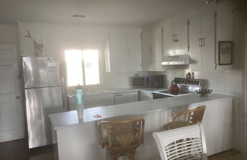 Holden Beach Cottage | Charming Beach House with Front and Back Porch water views