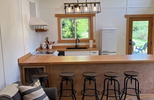 Mansons Landing Cabin | "Charming Cabin's Retreat: Pet-Friendly Haven with Sauna, Close to Stores, Lakes