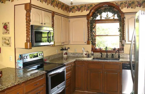 Harrison House | Charming country home nestled in nature down a short gravel road.