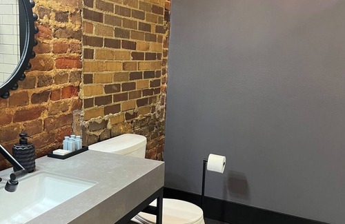 Marshall Apartment | Charming hotel suite in delightful downtown Marshall, TX with AC, WiFi.