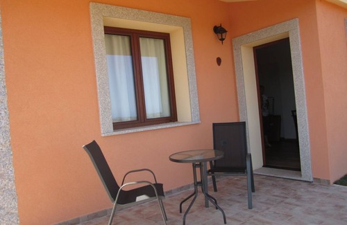 Aglientu Apartment | Charming juniper house with pool -solarium, sea view and lots of nature