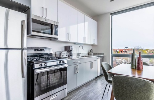 Logan Square Apartment | Charming Logan Square 2BR w/Gym, Roof Deck, 1 block to L, by Blueground