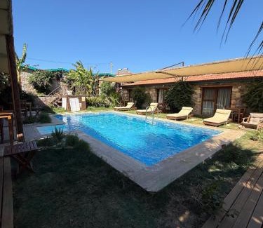 Ayvalik Apartment | Charming Poolside Stone Studios